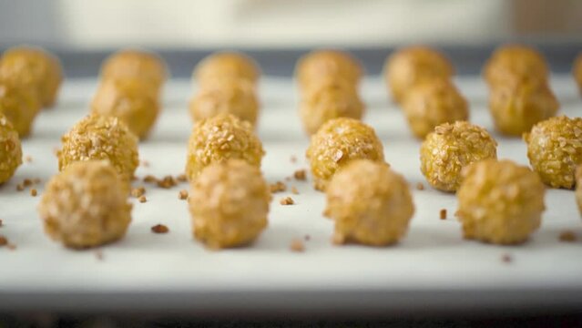 Preparation of panellets a traditional Spanish and Catalan sweets for All Saints Day and Halloween