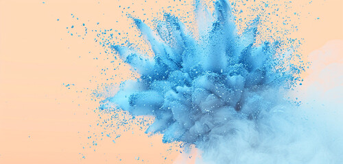 Dramatic explosion of blue chalk on a peach-colored background.