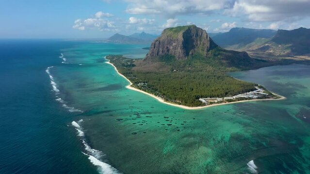 Aerial view of Mauritius island panorama and famous Le Morne Brabant mountain, beautiful blue lagoon and underwater waterfall. Le Morne Brabant peninsula and Underwater Waterfall, Mauritius.