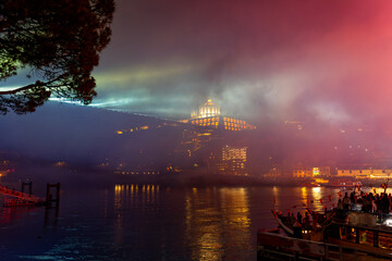 dom luiz brige lighht show in Porto on the riverside of Duero river cityscape at night