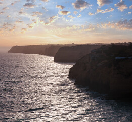 Evening sunset Atlantic rocky coastline, Algarve, Portugal