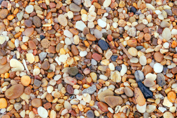 background of pebbles on the beach close up