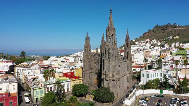 Aerial view of the Parroquia de San Juan Bautista de Arucas church in Arucas town, Gran Canaria, Canary Islands, Spain. Historic Neo-Gothic cathedral in Arucas.