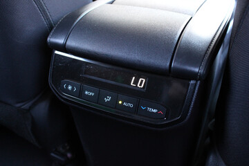 Climate control for rear passengers. Conditioner dashboard display.