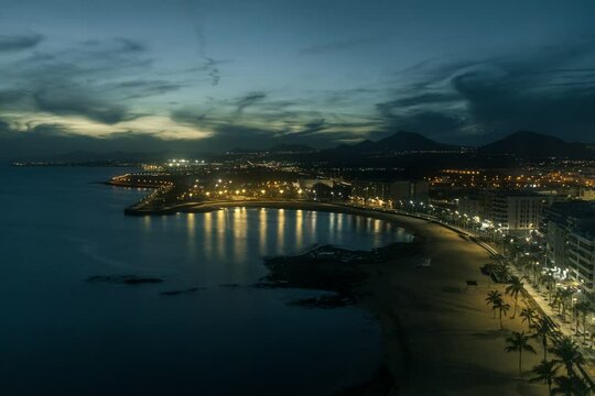 timelapse of a beach at sunset
