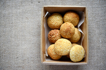 Sweet sesame cookies in a box on burlap. Cookies in a box.