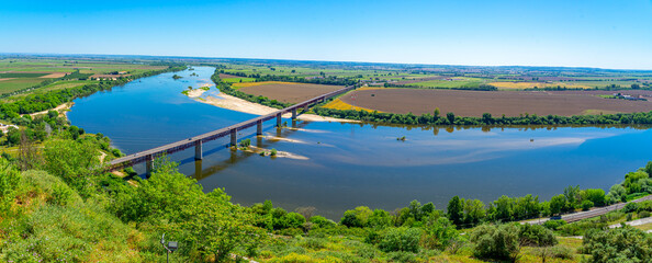 panoramic view of the Tagus River and the D.Luis I bridge from the Jardim das Portas do Sol in the...