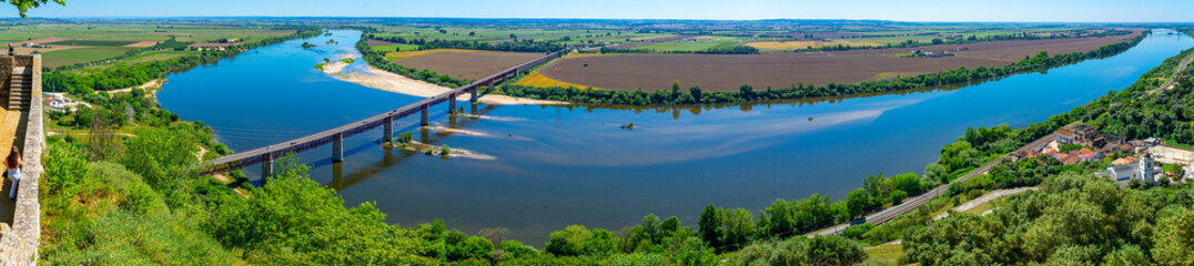 panoramic view of the Tagus River and the D.Luis I bridge from the Jardim das Portas do Sol in the...