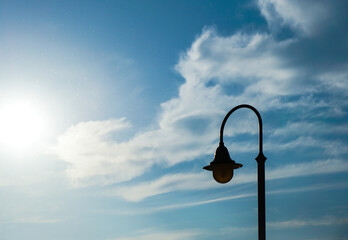 Low angle view of a lamp post against the sky