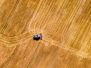 Tilling the Earth: Aerial View 4K UHD image Background of Tractor Plowing the Field for Seasonal...
