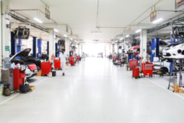 Blurry Line of body Car with the equipment repair station in the garage shop. fix maintenance or...