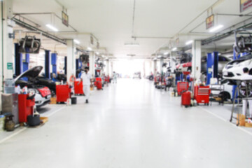 Blurry Line of body Car with the equipment repair station in the garage shop. fix maintenance or...
