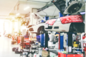 Blurry Line of body Car with the equipment repair station in the garage shop. fix maintenance or checking by mechanic workshop. Business about of car or vehicle concept.