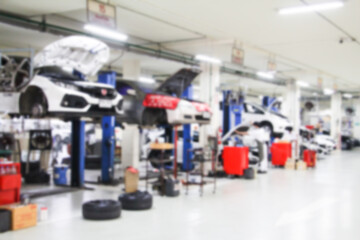 Blurry Line of body Car with the equipment repair station in the garage shop. fix maintenance or checking by mechanic workshop. Business about of car or vehicle concept.