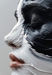 closeup persons face paint fashion cream dripping rubbery zen black oil bath girl studio symmetry