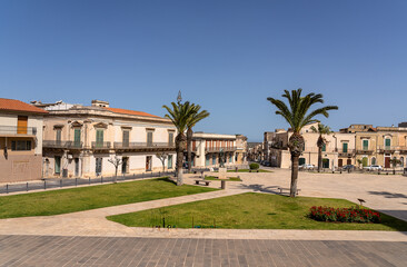  Main square known as Piazza Unità d'Italia in Ispica, a charming town in south-eastern Sicily,...