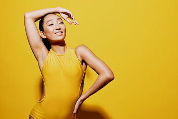 Woman beauty swimsuit smile trendy yellow fashion portrait