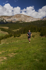 Trail runner man in a race - 808263821