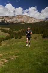 Trail runner man in a race - 808263865