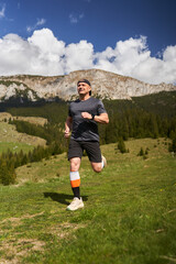 Trail runner man in a race - 808263890