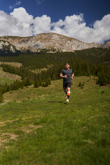 Trail runner man in a race - 808263898