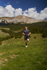 Trail runner man in a race - 808263899