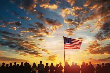 Silhouetted group of people gathered around an American flag during a sunset. 4th of July, american independence day, happy independence day of america , memorial day concept