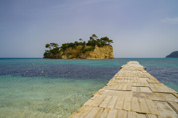 wooden pontoon to Caméo island  from Agios Sostis harbour