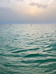 cloudy seascape, sea horizon, azure sea surface