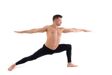 Fototapeta na wymiar Fitness and meditation. Healthy lifestyle. Young attractive man doing yoga on a white background.