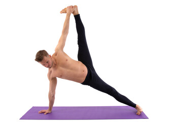 Fitness and meditation. Healthy lifestyle. Young attractive man doing yoga on a white background.