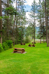 Picnic Table in Park with mountains at summer day in Vancouver, Canada, North America.
