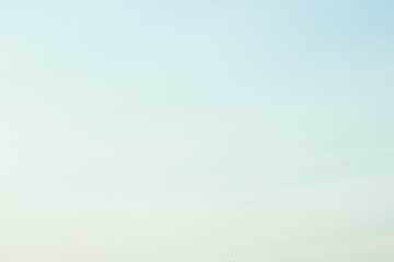 Fototapeta premium Blue, clear sky with clouds and sun.