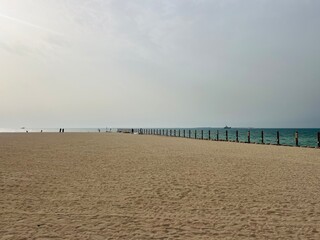 empty beach, cloudy seascape, magic heavens at the sea