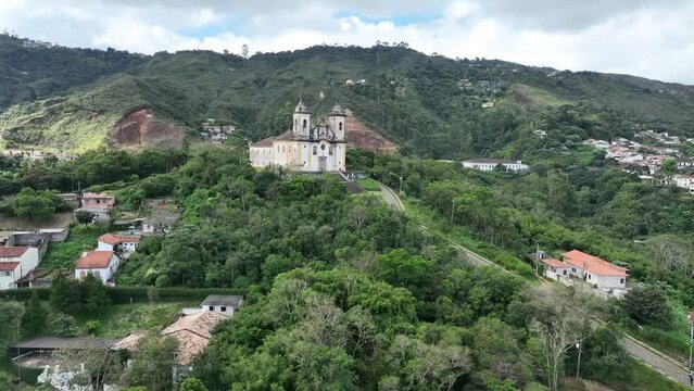 Explore the majestic S&atilde;o Francisco de Paula Church in Ouro Preto, MG, Brazil, with captivating aerial views captured by the DJI Mavic 3 drone. Discover the architectural beauty of this historic gem in