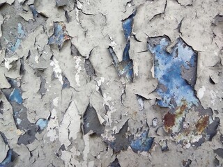 Photo texture old peeling paint. The paint is old. It is crumbling