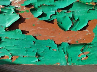 Photo texture old peeling paint. The paint is old. It is crumbling