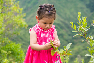 Young mother enjoying nature with her daughter