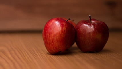 photography of red apples on wooden background