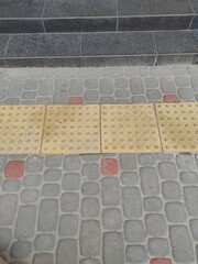 Cobblestone texture. Gray paving stones outside close-up. Design blank