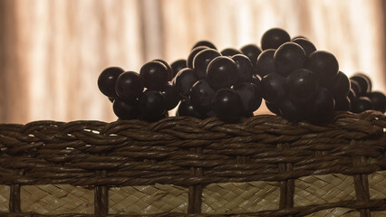 grapes on wicker basket, fruit - Powered by Adobe