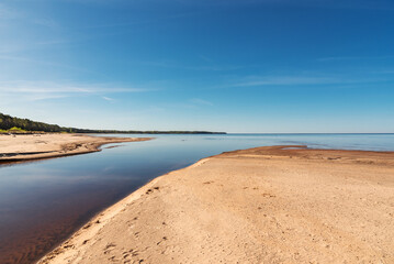 Vitrupe river mouth on sunny spring day