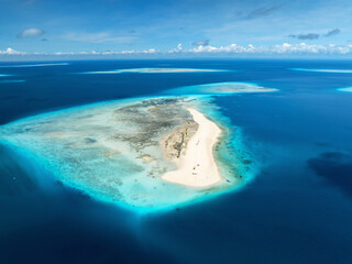 Aerial view of Nakupenda island in low tide, sandbank in ocean, white sand, boats, blue sea during...