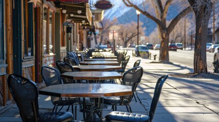 Empty tables at sidewalk cafe Lone Pine Inyo County
