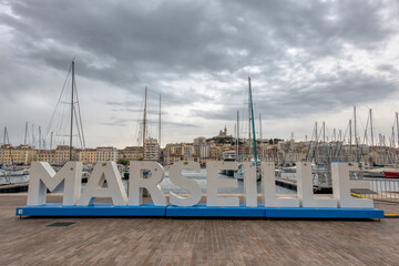Large letters form the name of the city in Vieux-Port, Marseille, France.