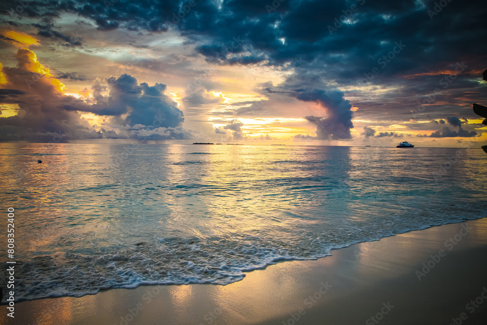 Wall mural amazing sunset over the sea on a tropical island