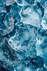 Panoramic banner of blue ice cubes on a light cold blue background, perfect for chilling concepts