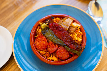 Migas with fish and vegetables. Typical spanish cuisine