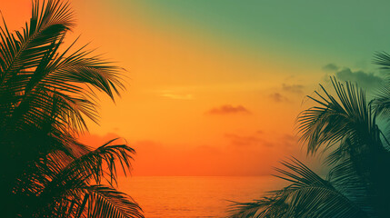 Vibrant tropical sunset creating beautiful silhouettes of palm trees against an orange sky