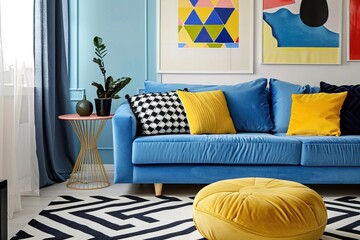 Blue sofa with yellow pillows, contemporary home interior design in vivid colors, black and white...